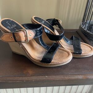 Linea Paolo Glossy Black and Tan T Strap Wedges